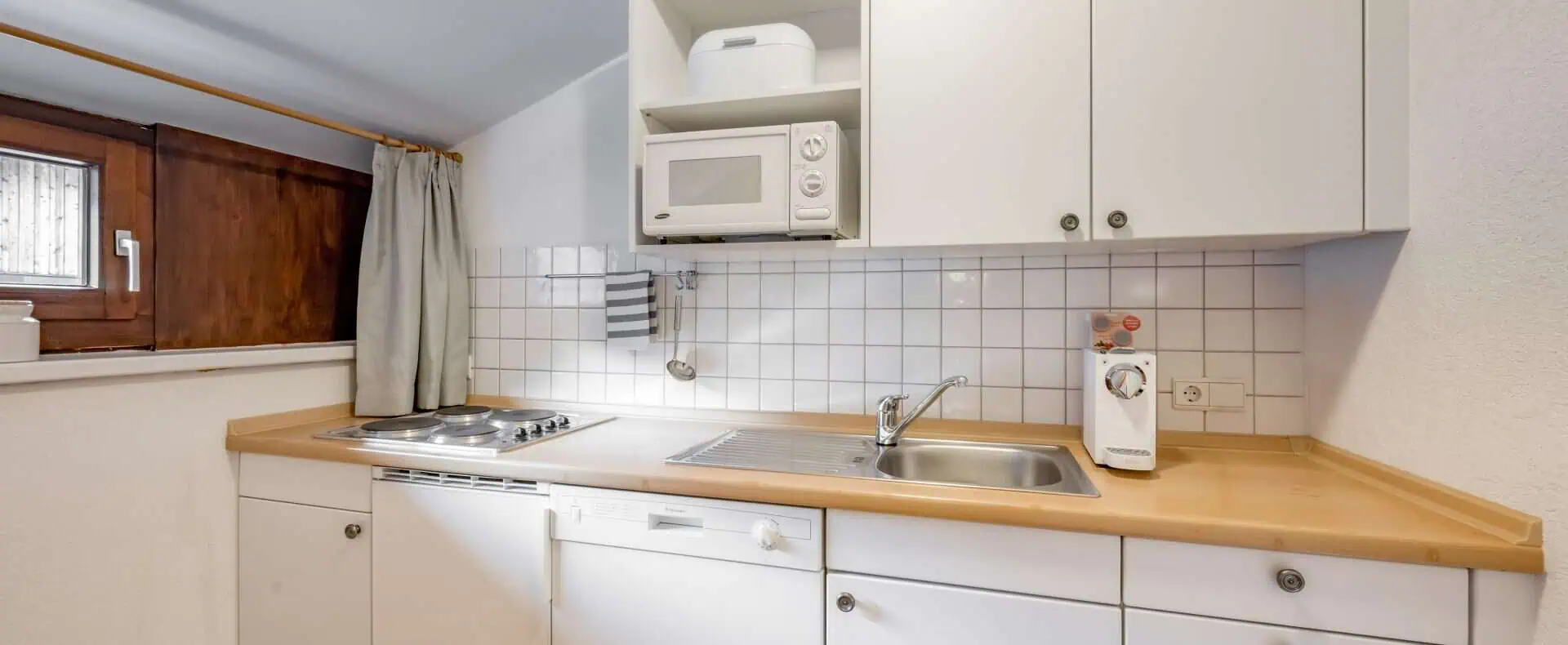 Inntalerhof, Küche am Zimmer