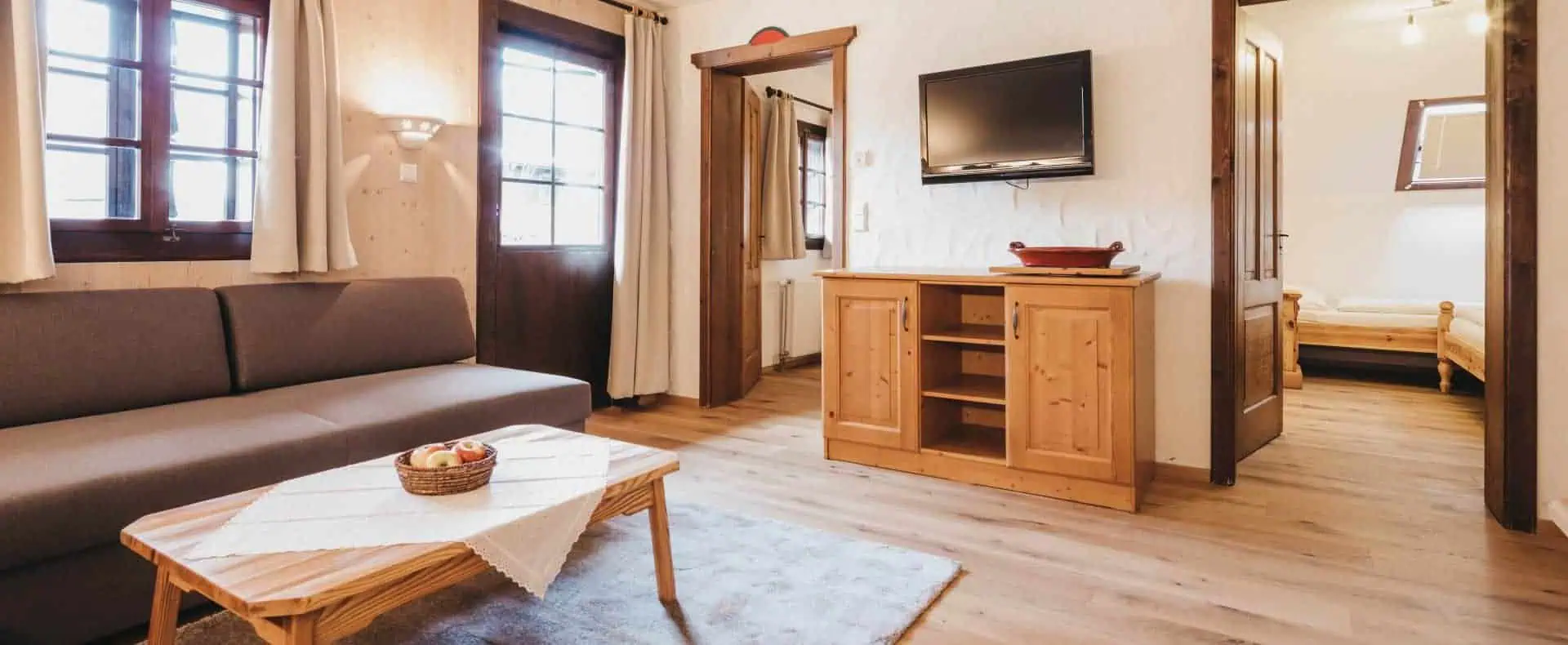 Hoteldorf Schönleitn Apartment Felsenfest Wohnbereich. (c)Heldentheater